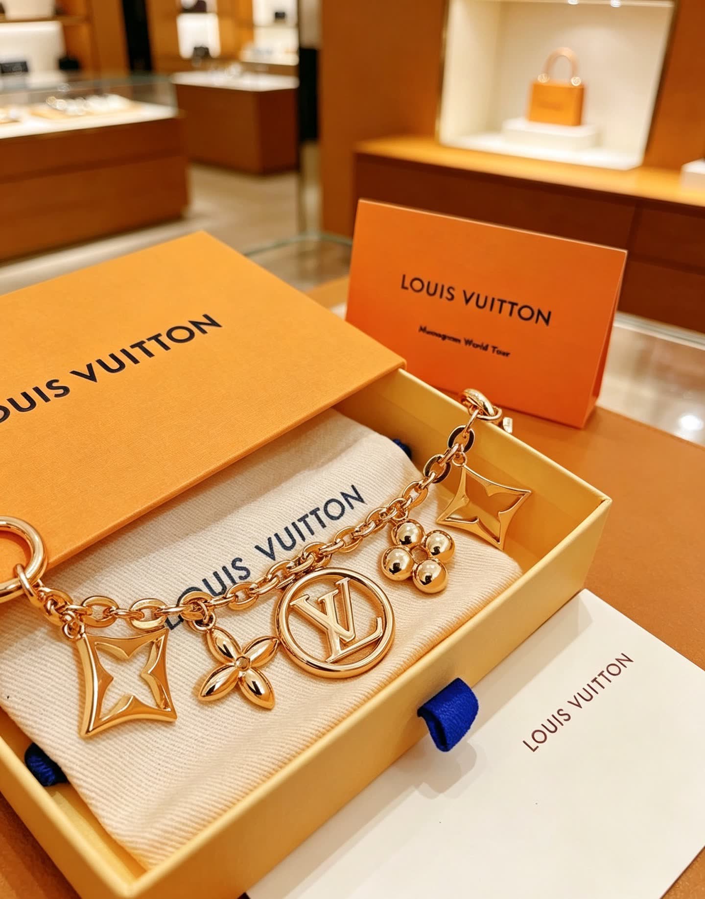 Louis Vuitton Gold Tone Charm Bracelet